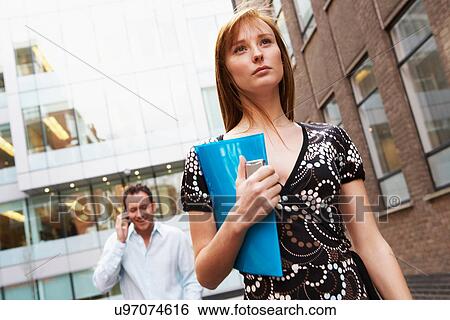 Business people walking on street View Large Photo Image Stock Photograph - Business people walking on street. Fotosearch