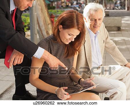 Business people working outdoors View Large Photo Image Stock Image - Business people working outdoors. Fotosearch