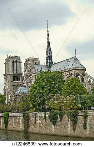 Stock Photo - Cathedral on city canal. Fotosearch