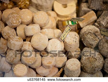 Cheeses for sale View Large Photo Image Stock Photography - Cheeses for sale. Fotosearch