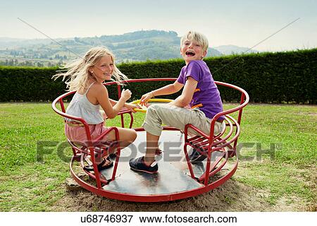 Stock Photo - Children playing in backyard. Fotosearch