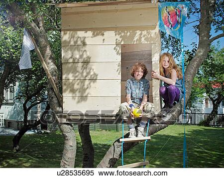 Children playing in treehouse View Large Photo Image Stock Photography - Children playing in treehouse. Fotosearch