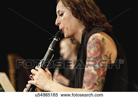 Clarinet player in orchestra View Large Photo Image Stock Photography - Clarinet player in orchestra. Fotosearch