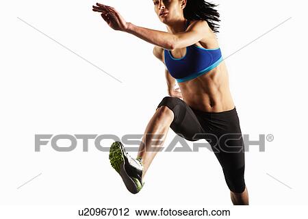 Stock Image - Close up of athlete running. Fotosearch