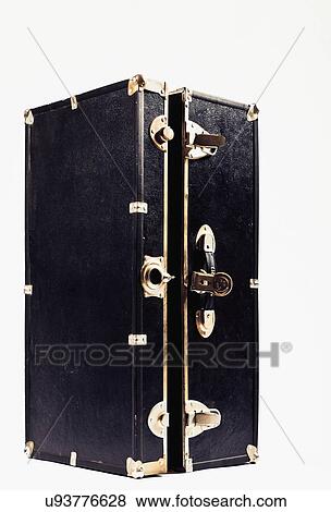 Stock Photo - Close up of black and gold trunk. Fotosearch