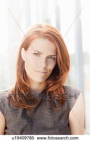 Stock Photography - Close up of businesswoman's smiling face. Fotosearch
