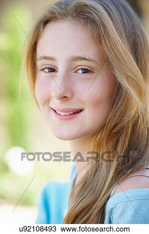 Close up of girl's smiling face View Large Photo Image Stock Image - Close up of girl's smiling face. Fotosearch
