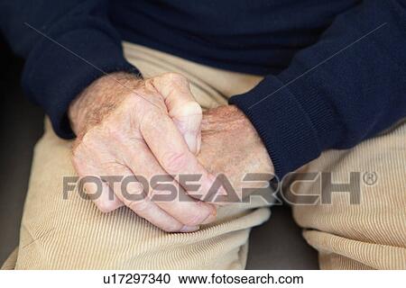 Close up of older man's folded hands View Large Photo Image Stock Image - Close up of older man's folded hands. Fotosearch