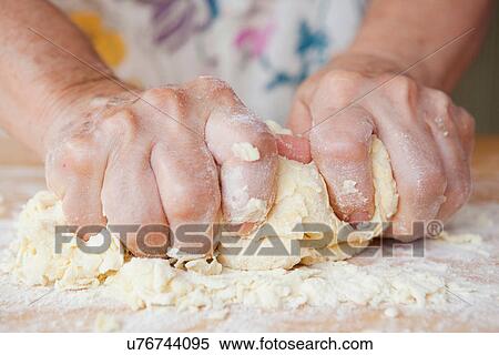 Close up of older woman kneading dough View Large Photo Image Stock Photography - Close up of older woman kneading dough. Fotosearch
