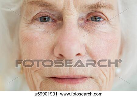 Close up of older woman's face View Large Photo Image Stock Image - Close up of older woman's face. Fotosearch
