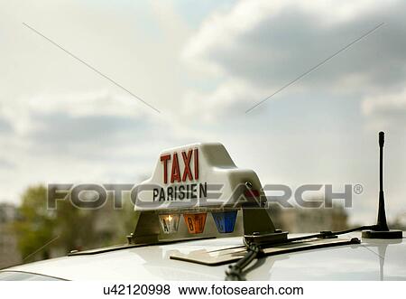 Stock Photo - Close up of Parisian taxi light. Fotosearch