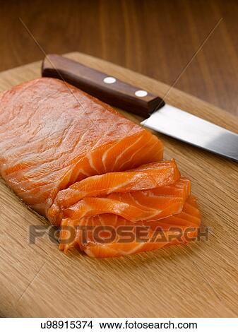 Picture - Close up of sliced salmon. Fotosearch