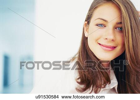 Picture - Close up of smiling woman's face. Fotosearch