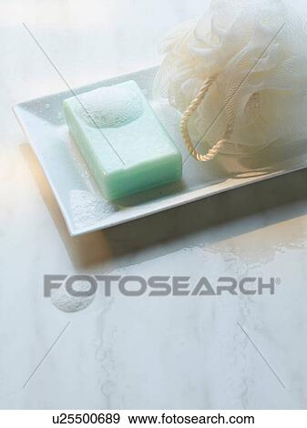 Close up of soap and loofah View Large Photo Image Stock Photo - Close up of soap and loofah. Fotosearch