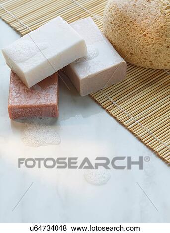 Close up of soap on straw mat View Large Photo Image Stock Photo - Close up of soap on straw mat. Fotosearch