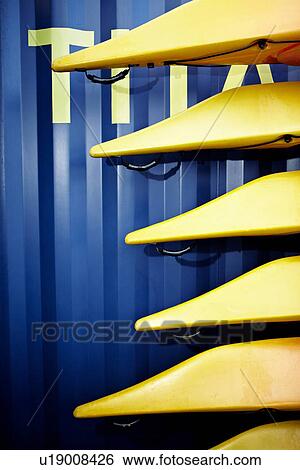 Close up of stacked kayaks View Large Photo Image Stock Photograph - Close up of stacked kayaks. Fotosearch
