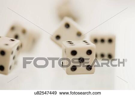 Close up of tumbling dice View Large Photo Image Stock Photo - Close up of tumbling dice. Fotosearch