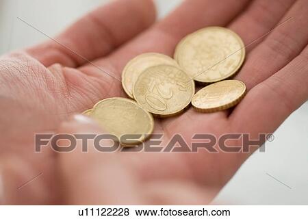 Close up of woman counting Euro coins View Large Photo Image Stock Photo - Close up of woman counting Euro coins. Fotosearch