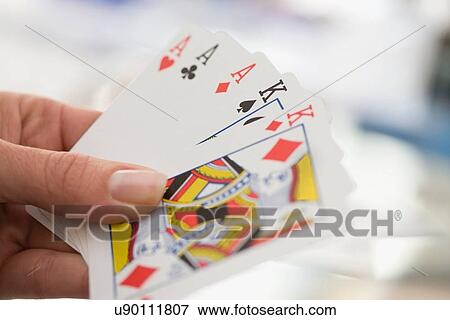 Close up of woman playing cards View Large Photo Image Stock Photo - Close up of woman playing cards. Fotosearch
