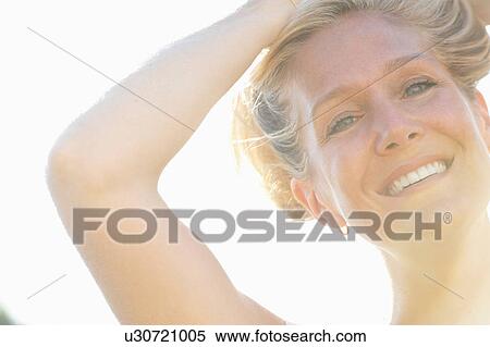 Close up of womans smiling face View Large Photo Image Stock Photography - Close up of womans smiling face. Fotosearch