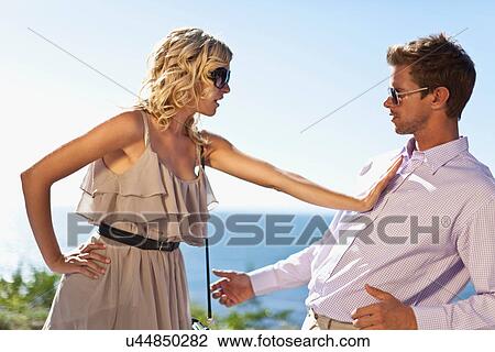 Stock Image - Couple arguing outdoors. Fotosearch
