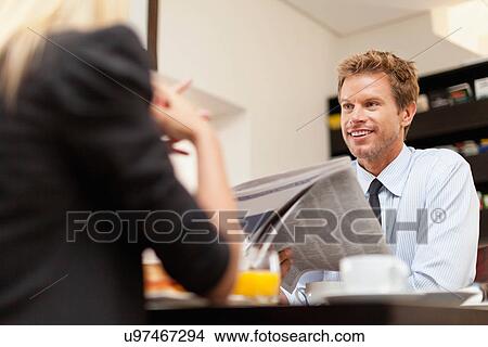 Couple having breakfast together View Large Photo Image Picture - Couple having breakfast together. Fotosearch