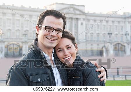 Couple outside Buckingham Palace View Large Photo Image Stock Photo - Couple outside Buckingham Palace. Fotosearch