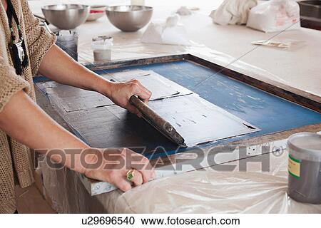 Designer printing on textiles in studio View Large Photo Image Stock Image - Designer printing on textiles in studio. Fotosearch