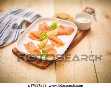 Dish of hand reared Scottish smoked salmon View Large Photo Image Stock Photo - Dish of hand reared Scottish smoked salmon. Fotosearch