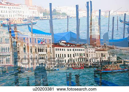 Stock Image - Double exposure of pier and buildings. Fotosearch
