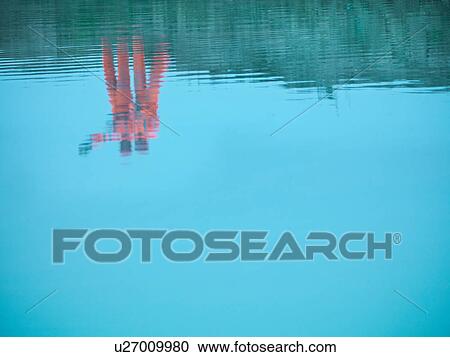 Ecologists reflected in water on quarry site View Large Photo Image Stock Image - Ecologists reflected in water on quarry site. Fotosearch
