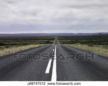 Empty road in dry rural landscape View Large Photo Image Stock Image - Empty road in dry rural landscape. Fotosearch
