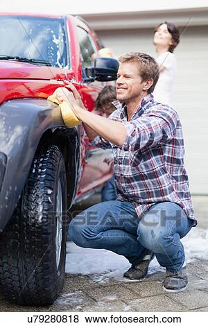 Family washing car together View Large Photo Image Stock Photo - Family washing car together. Fotosearch