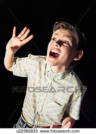 Frightened boy gasping View Large Photo Image Stock Image - Frightened boy gasping. Fotosearch