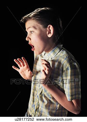 Frightened boy gasping View Large Photo Image Stock Image - Frightened boy gasping. Fotosearch