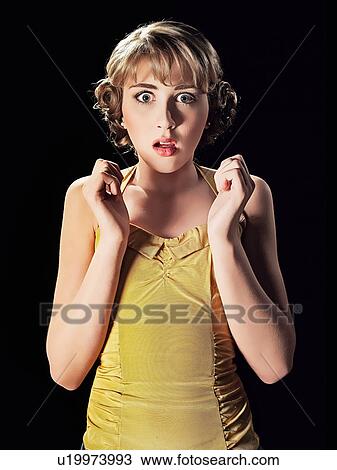 Stock Image - Frightened girl gasping. Fotosearch