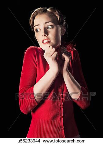 Picture - Frightened girl. Fotosearch