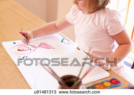 Girl painting with watercolors View Large Photo Image Stock Image - Girl painting with watercolors. Fotosearch