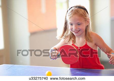 Girl playing table tennis View Large Photo Image Stock Image - Girl playing table tennis. Fotosearch