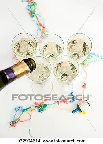 Glasses of champagne at party View Large Photo Image Picture - Glasses of champagne at party. Fotosearch