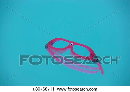 Goggles floating in swimming pool View Large Photo Image Stock Image - Goggles floating in swimming pool. Fotosearch