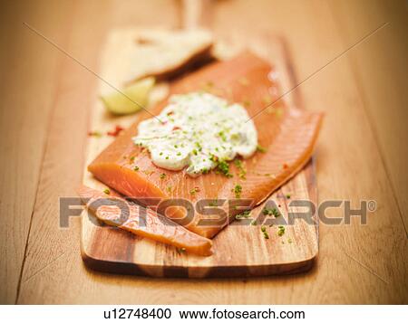 Hand-reared Scottish smoked salmon on board View Large Photo Image Stock Image - Hand-reared Scottish smoked salmon on board. Fotosearch