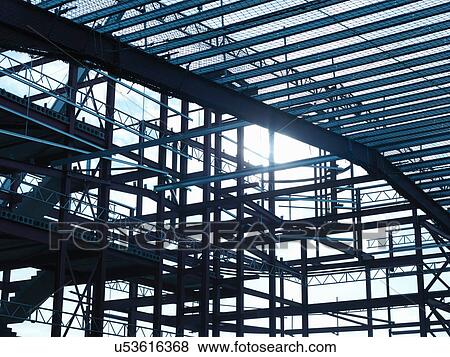 Low angle view of steel construction frame on building site View Large Photo Image Stock Photo - Low angle view of steel construction frame on building site. Fotosearch