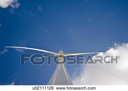 Stock Photograph - Low angle view of wind turbine. Fotosearch