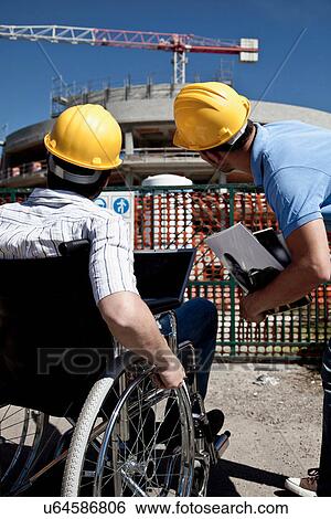 Man in wheelchair at construction site View Large Photo Image Stock Photograph - Man in wheelchair at construction site. Fotosearch
