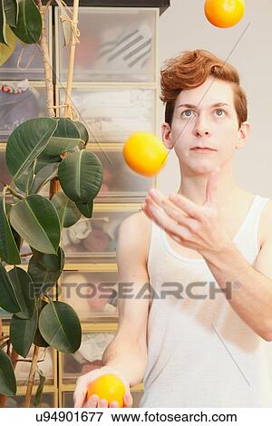 Man juggling fruit View Large Photo Image Stock Photo - Man juggling fruit. Fotosearch