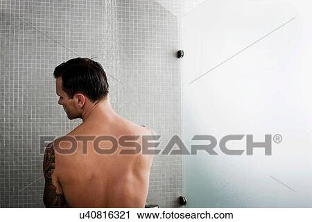 Man rinsing in shower View Large Photo Image Stock Image - Man rinsing in shower. Fotosearch