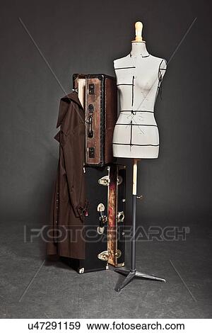 Stock Photo - Mannequin and vintage trunks. Fotosearch