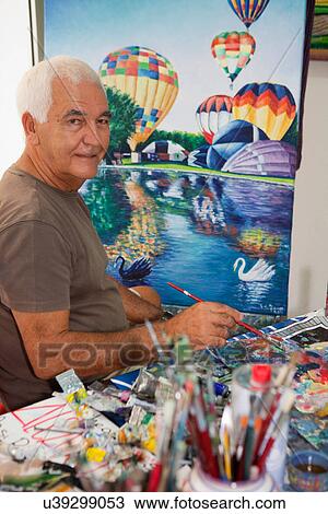 Older artist painting in studio View Large Photo Image Stock Image - Older artist painting in studio. Fotosearch