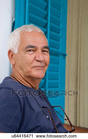 Older man smiling outdoors View Large Photo Image Stock Image - Older man smiling outdoors. Fotosearch
